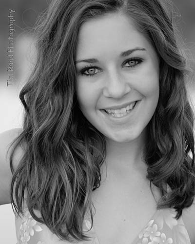 a black and white image of a young model